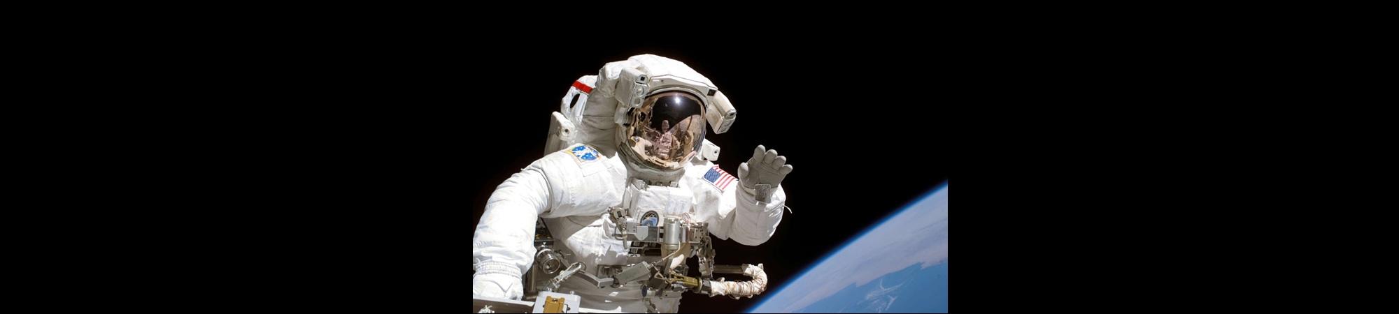 Astronaut space walking with earth in background